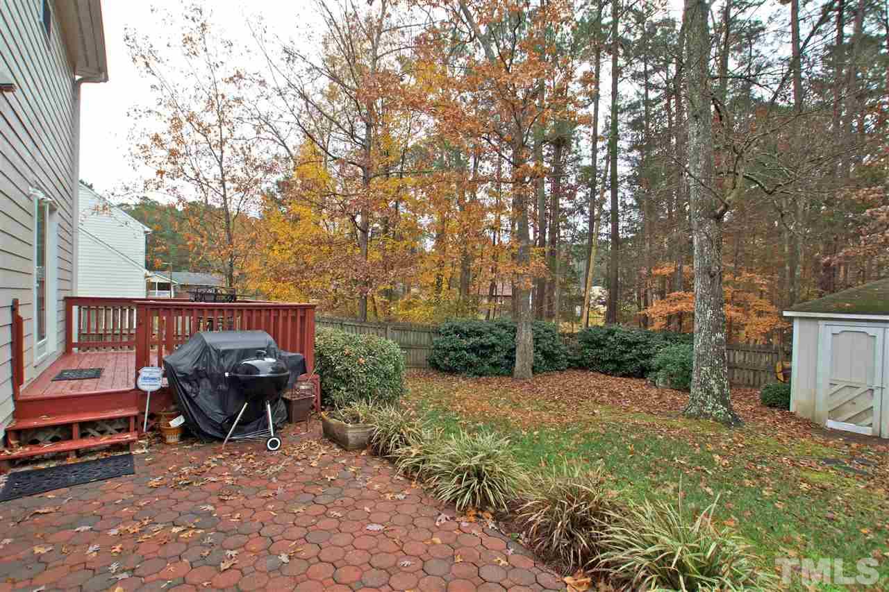 724 Windcrest Road Durham, NC 27713 - Photo 21 of 24 Enjoy your lush landscaping on your patio in your private backyard.