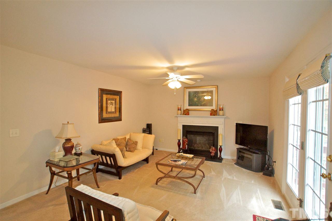 724 Windcrest Road Durham, NC 27713 - Photo 10 of 24 Oversized family room with plenty of space to enjoy an evening with family and friends.