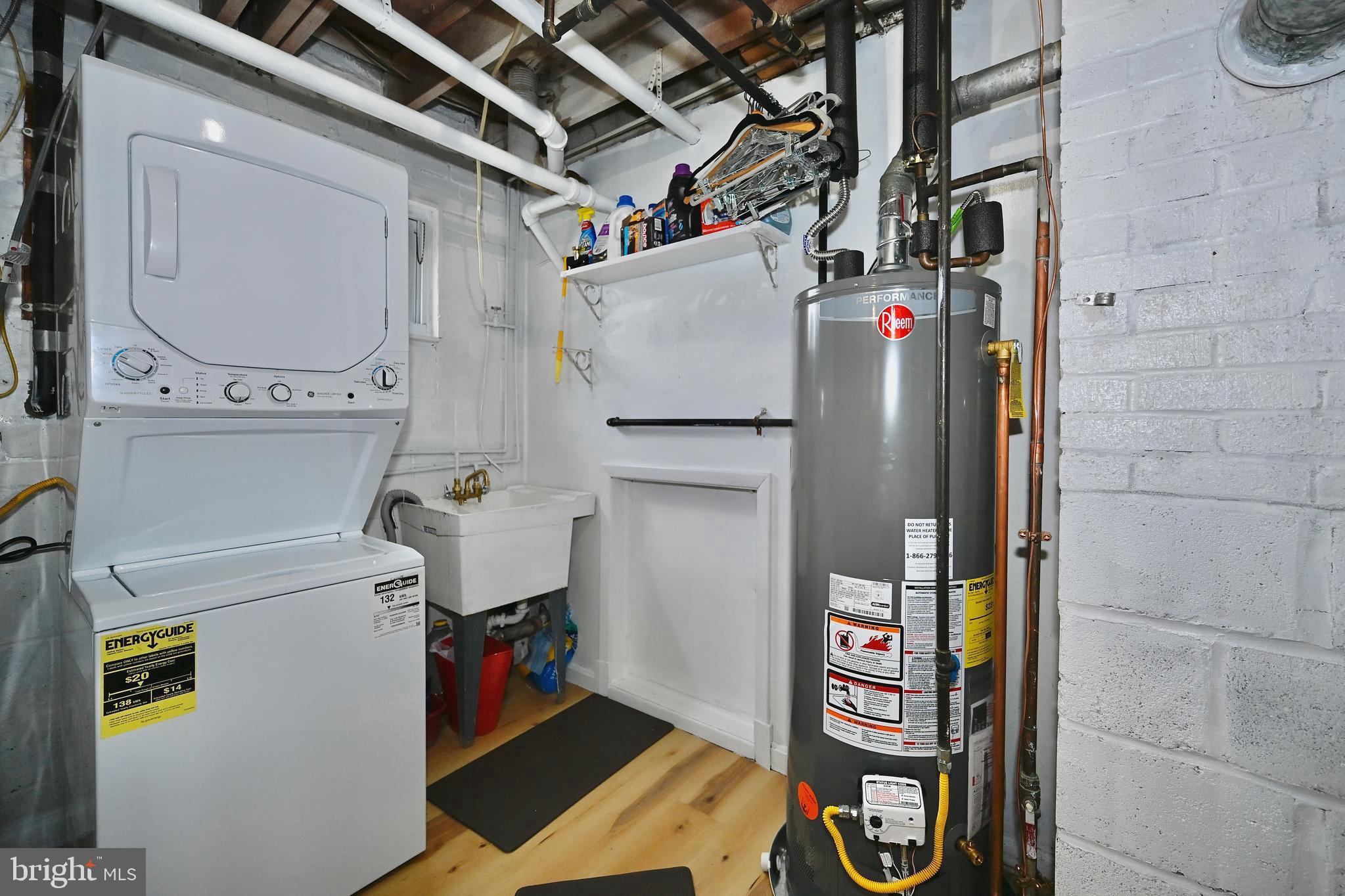 3308 Kayson Street Silver Spring, MD 20906 - Photo 26 of 30 Utility room w/new water heater and washer/dryer