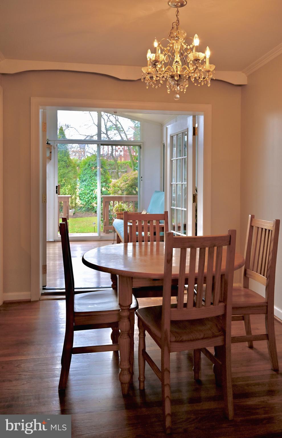 3308 Kayson Street Silver Spring, MD 20906 - Photo 8 of 30 Dining room opens to sunroom