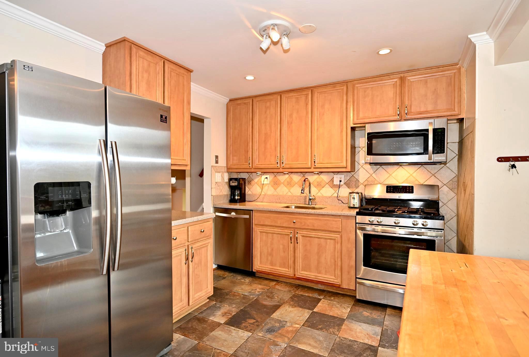 3308 Kayson Street Silver Spring, MD 20906 - Photo 10 of 30 Kitchen with stainless appliances
