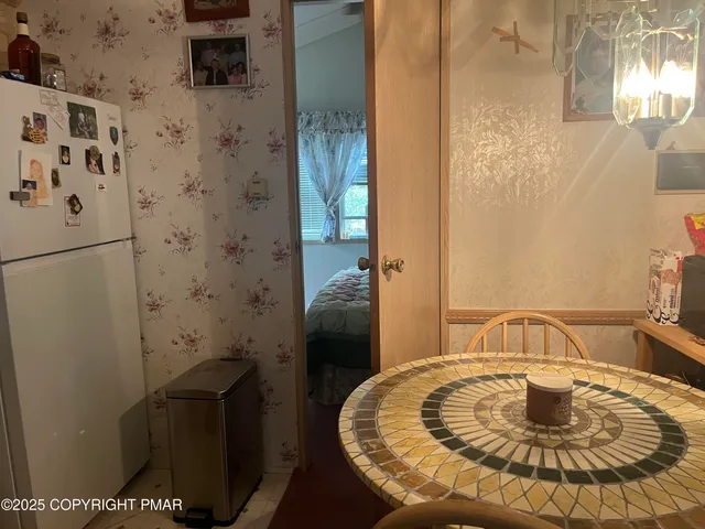 a bed room with a bed and a baby crib