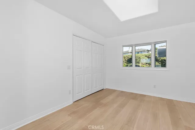 a bathroom with a sink a mirror and shower