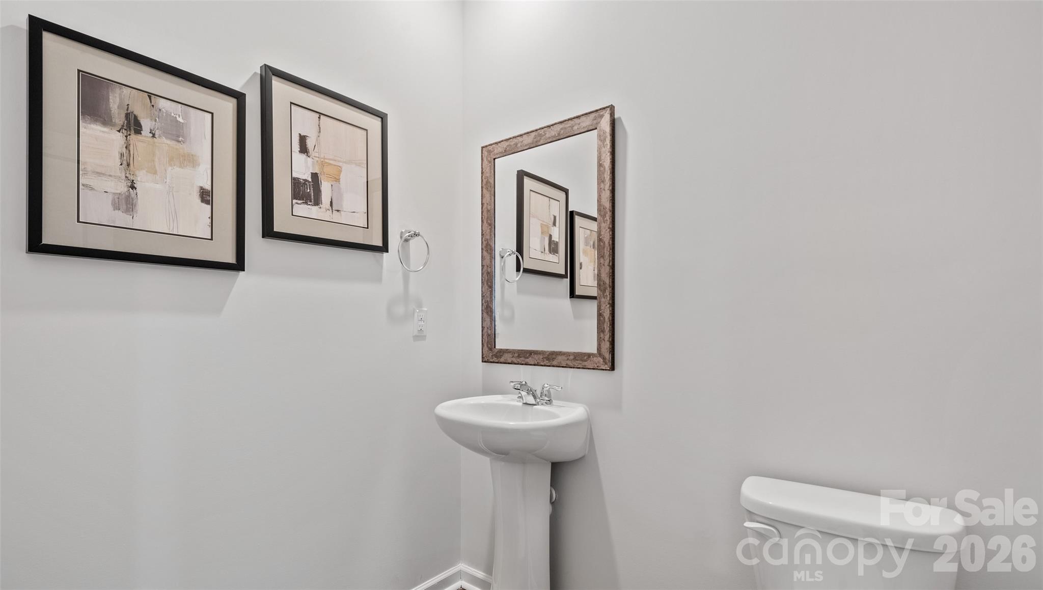 45 Piney Wds Road Fletcher, NC 28732 - Photo 16 of 34 a bathroom with a sink and a mirror