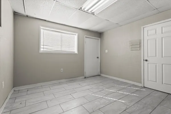 a view of an empty room with window