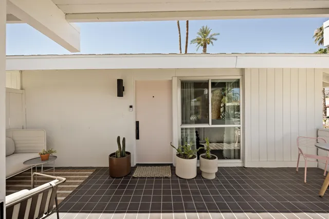 a view of a house with a swimming pool