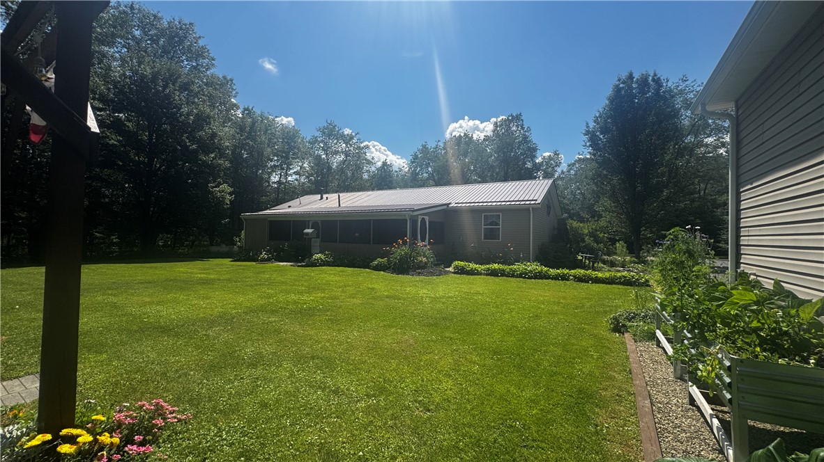 87 Collins Road Lewis Run, PA 16738 - Photo 35 of 48 Back of home with raised gardens-will stay
