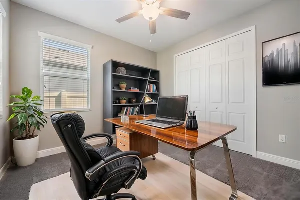 a living room with furniture and a window