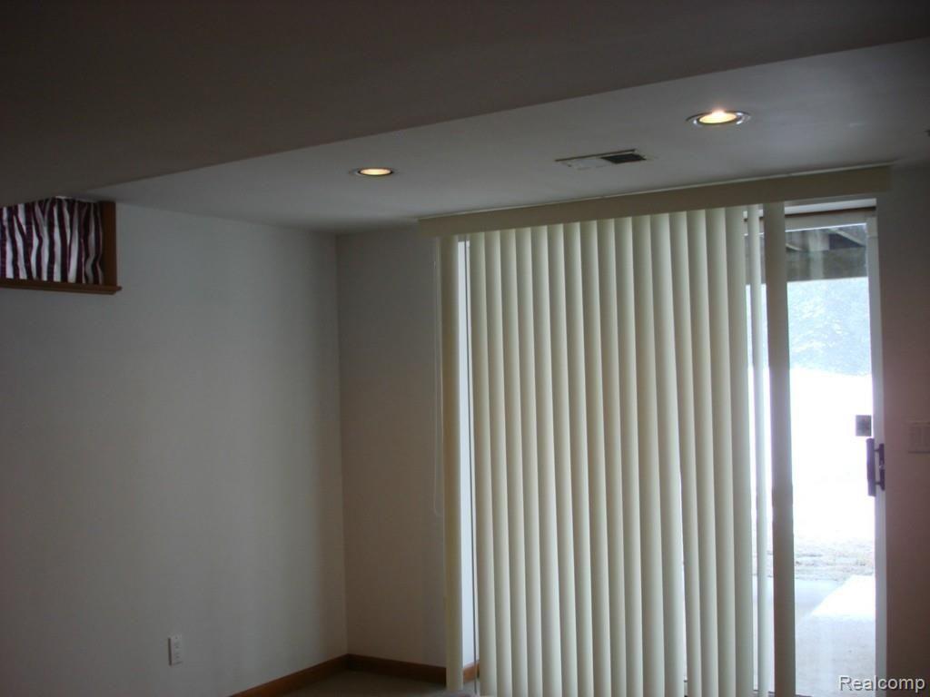 5537 Farley Road Clarkston, MI 48346 - Photo 8 of 16 DOOR WALL IN FINISHED W/O BASEMENT