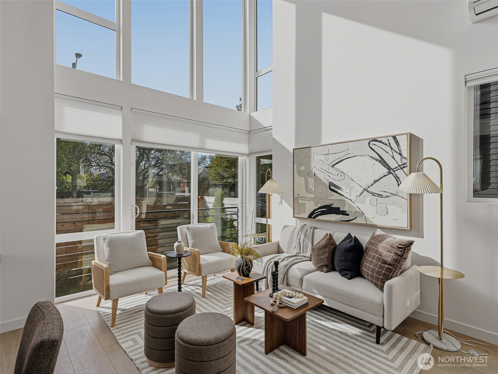 6320 41st Avenue Southwest, Unit A Seattle, WA 98136 - Photo 3 of 39 a living room with furniture and a large window