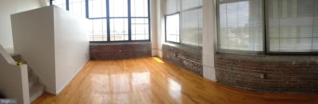 a bathroom with a bathtub and window