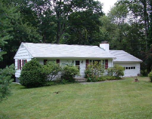76 Soundview Road Ridgefield, CT 06877 - Photo 1 of 1 a view of a house with garden