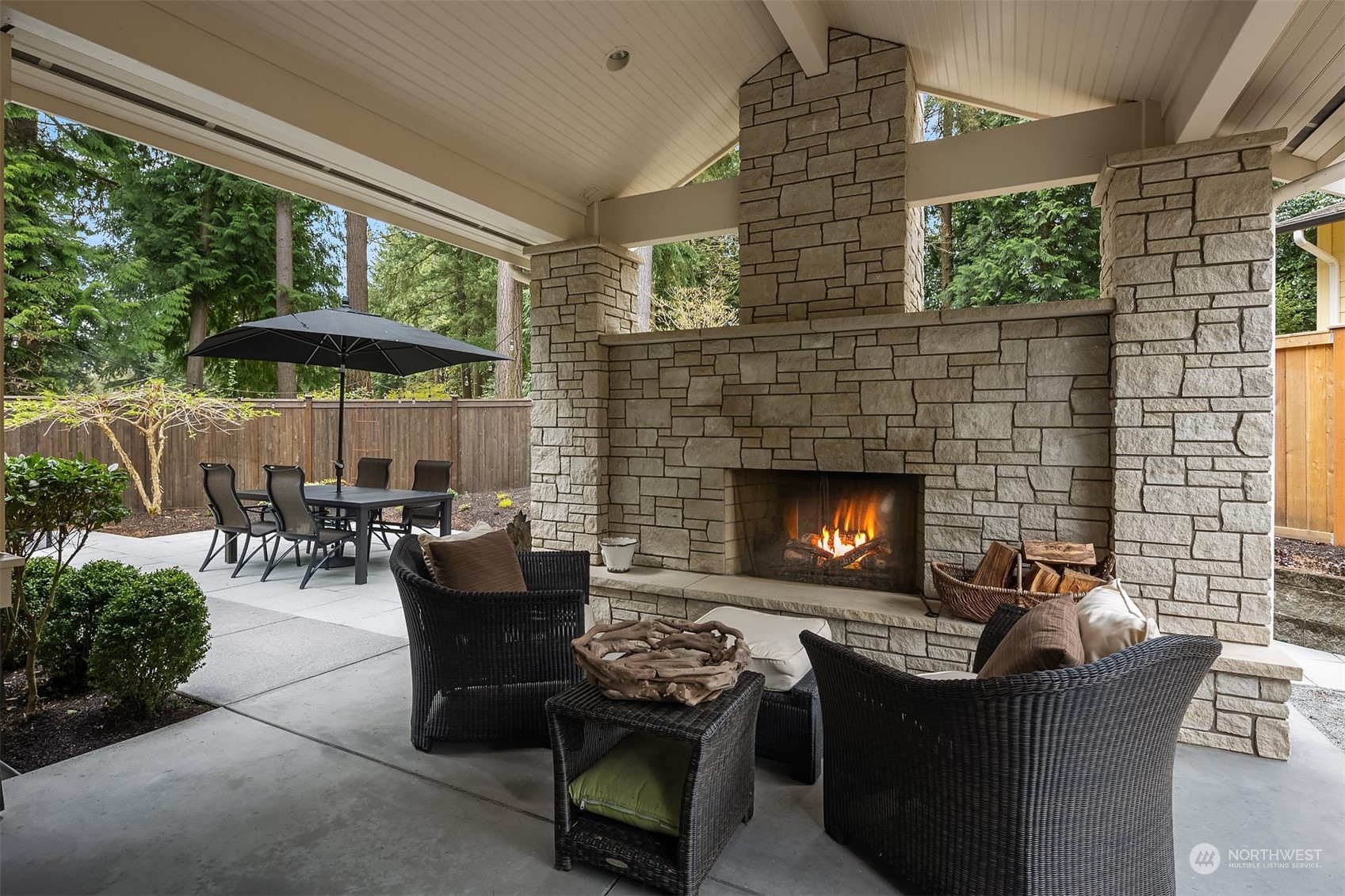 9013 Northeast 190th Street Bothell, WA 98011 - Photo 12 of 39 a living room with furniture and a fireplace