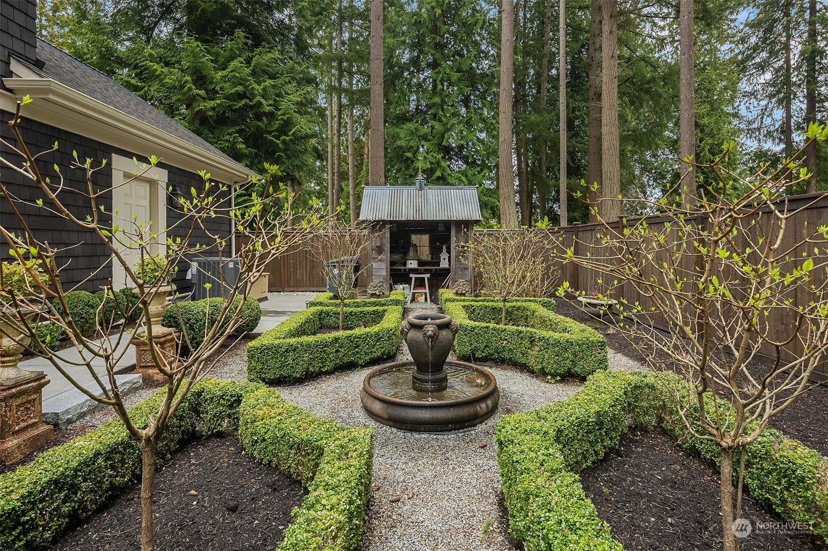 9013 Northeast 190th Street Bothell, WA 98011 - Photo 15 of 39 a front view of a house with garden and patio