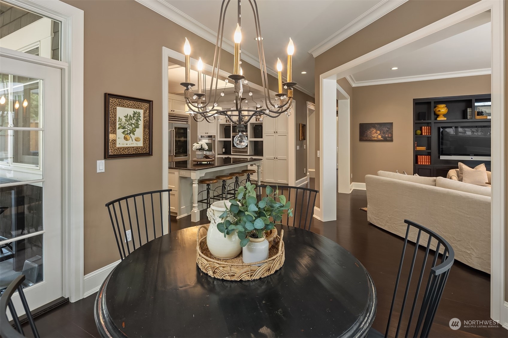 9013 Northeast 190th Street Bothell, WA 98011 - Photo 16 of 39 a view of a dining room with furniture and wooden floor