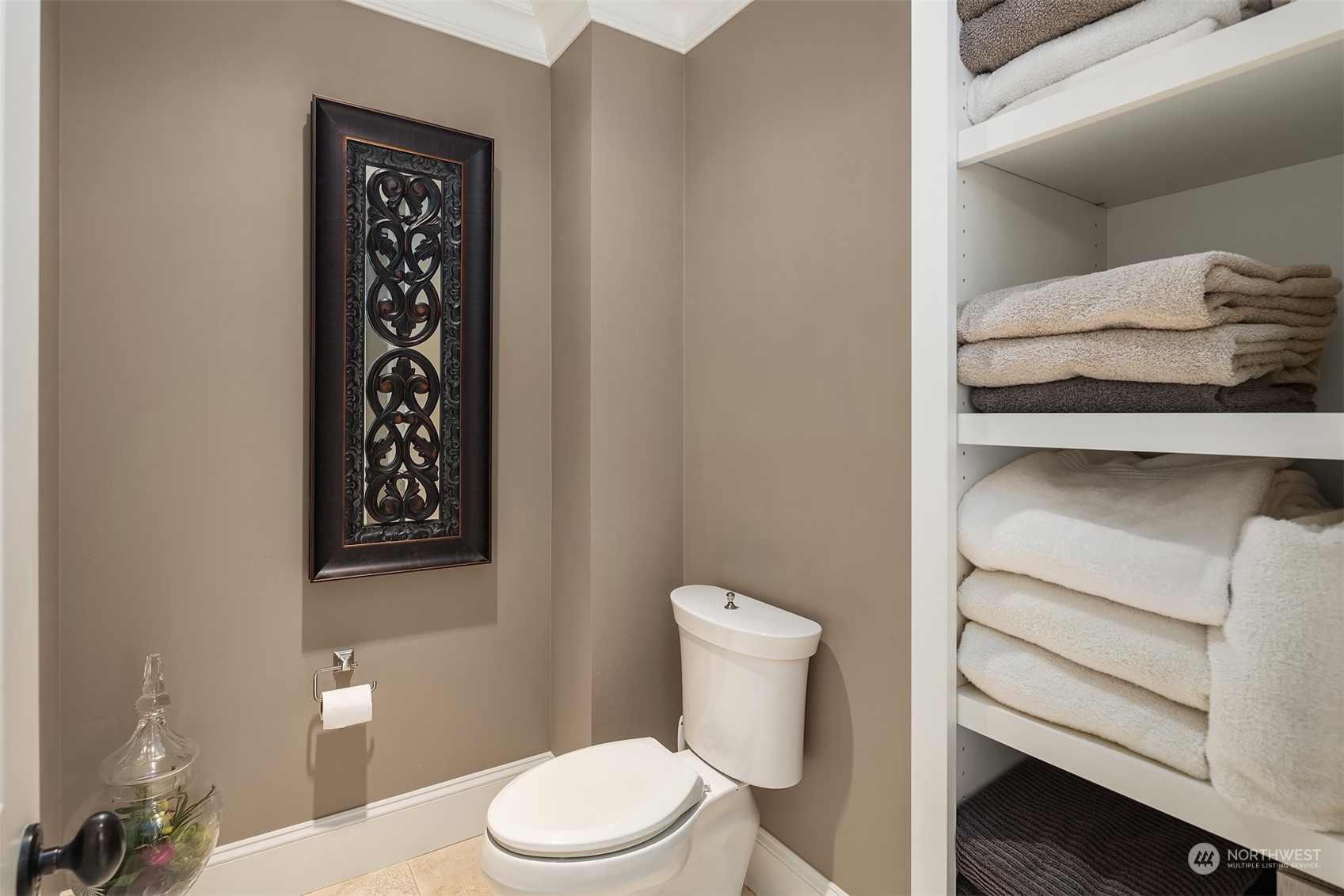 9013 Northeast 190th Street Bothell, WA 98011 - Photo 24 of 39 a white toilet sitting next to a white cabinet