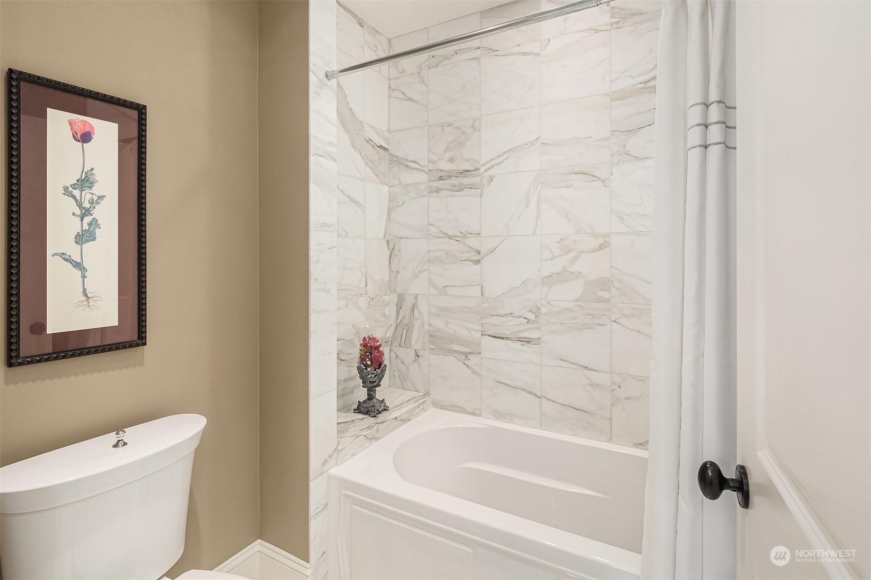 9013 Northeast 190th Street Bothell, WA 98011 - Photo 28 of 39 a bath room with a toilet and a bath tub
