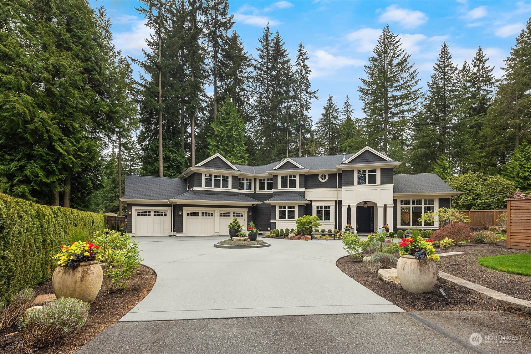9013 Northeast 190th Street Bothell, WA 98011 - Photo 37 of 39 a front view of a house with a garden