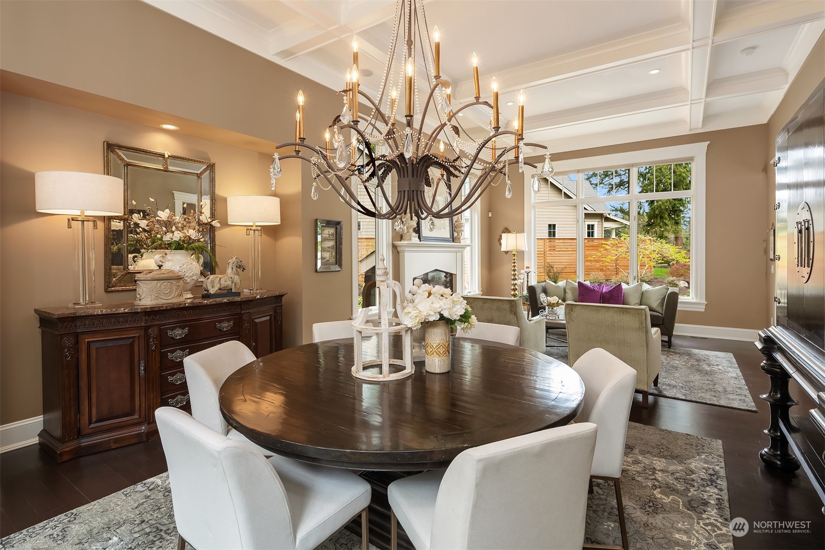 9013 Northeast 190th Street Bothell, WA 98011 - Photo 6 of 39 a dining room with furniture a floor to ceiling window and potted plants