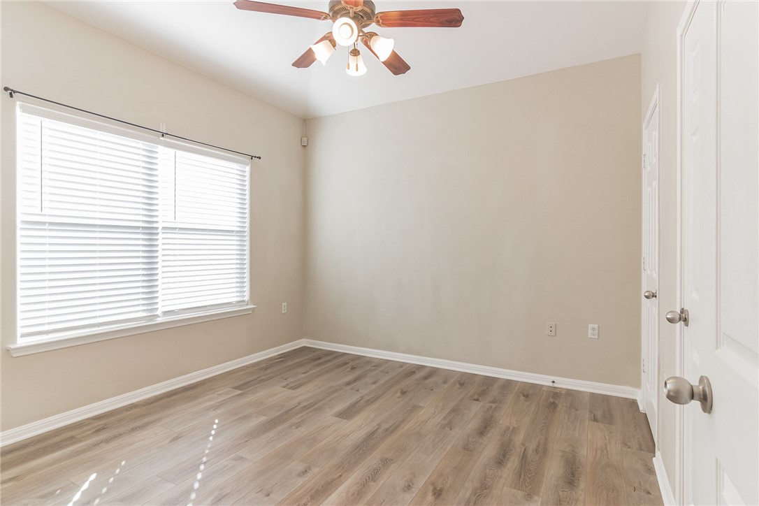5625 Signal Point Austin, TX 78724 - Photo 8 of 28 Main Bedroom. Notice the ceiling fan and large windows.