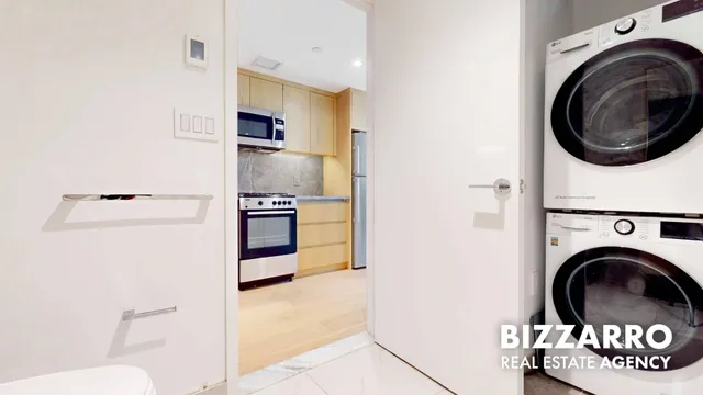 a view of kitchen and washer and dryer