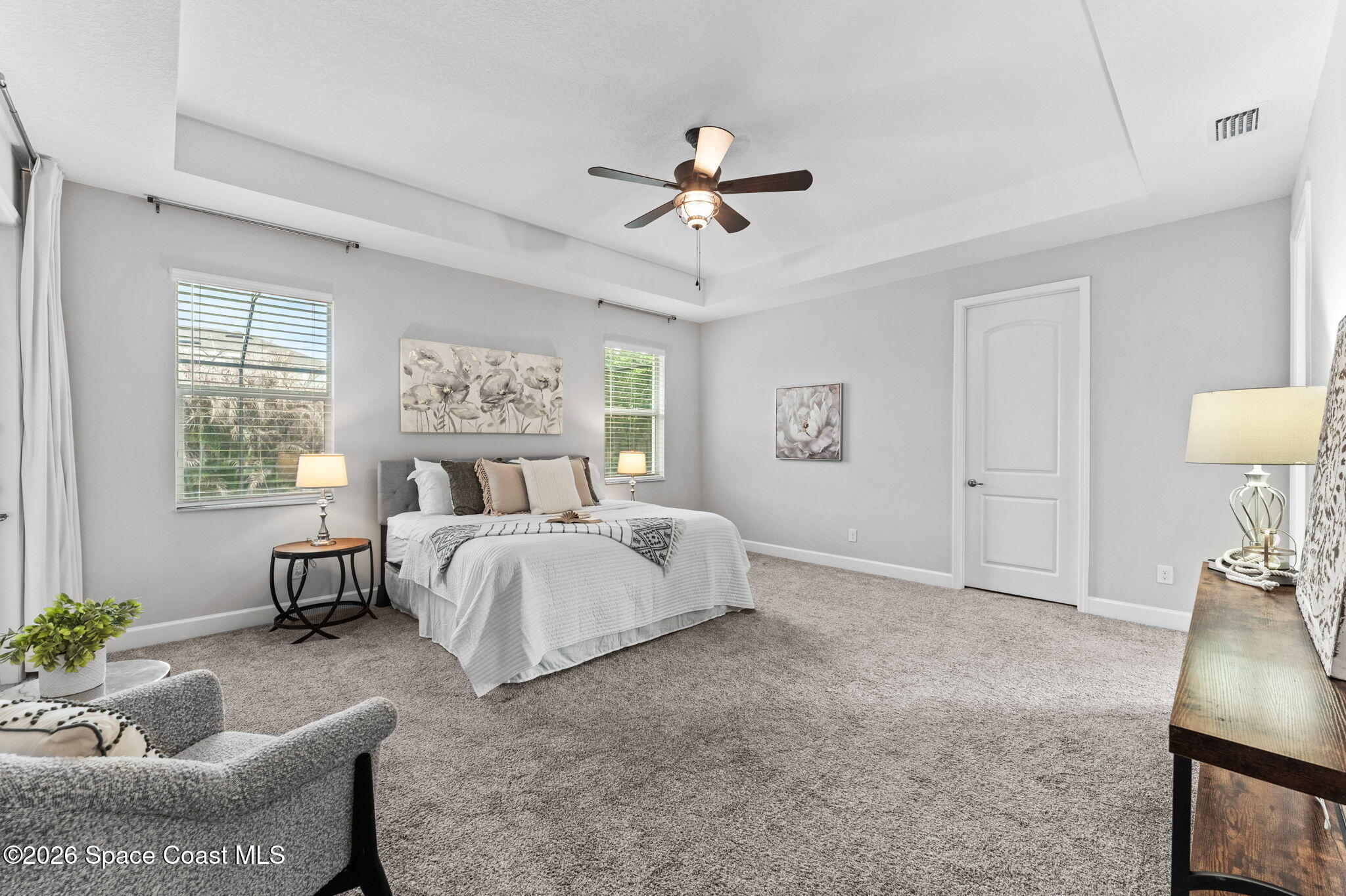 3158 Addison Drive Melbourne, FL 32940 - Photo 19 of 51 a bed room with a bed and a couch