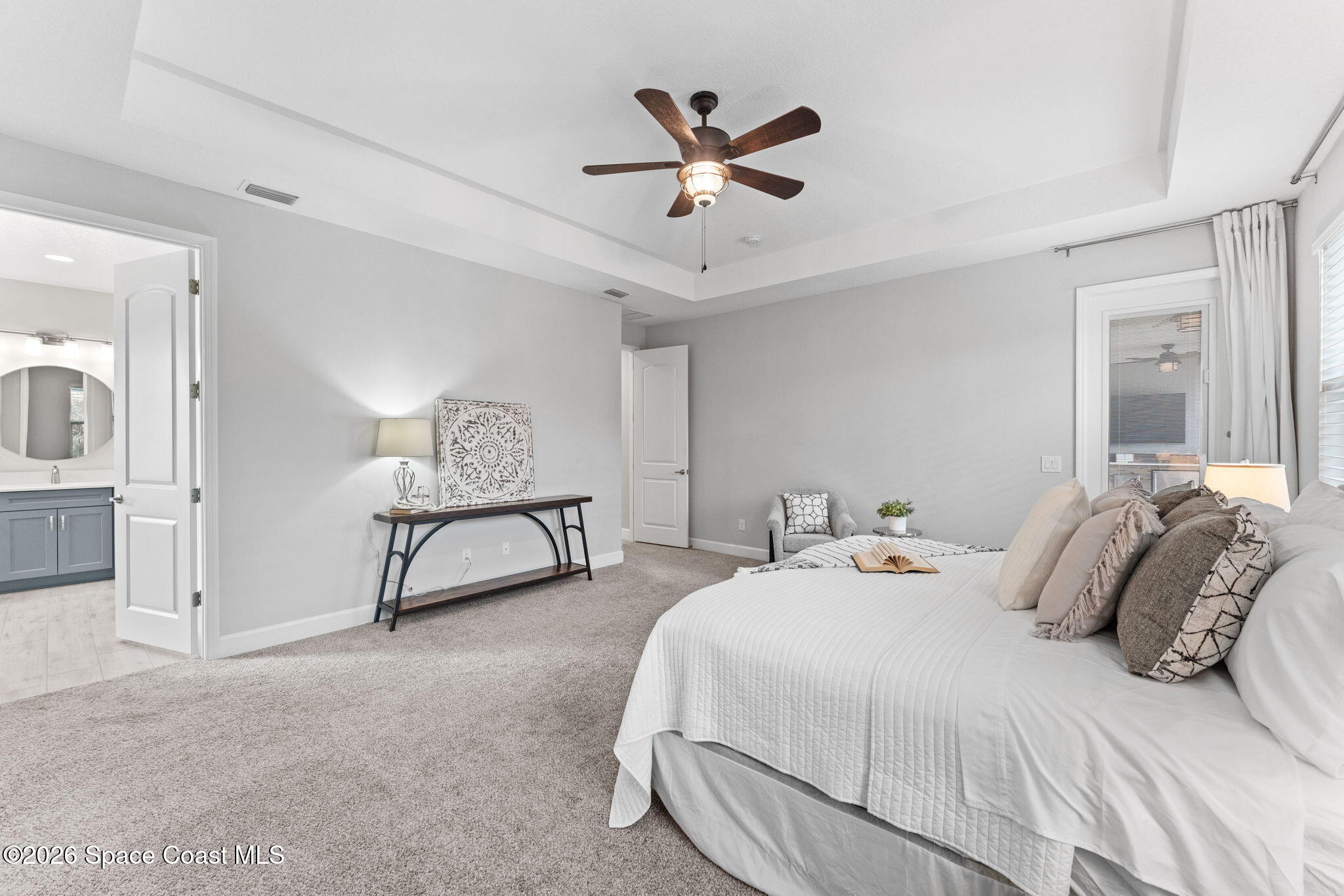 3158 Addison Drive Melbourne, FL 32940 - Photo 21 of 51 a bedroom with bed and window