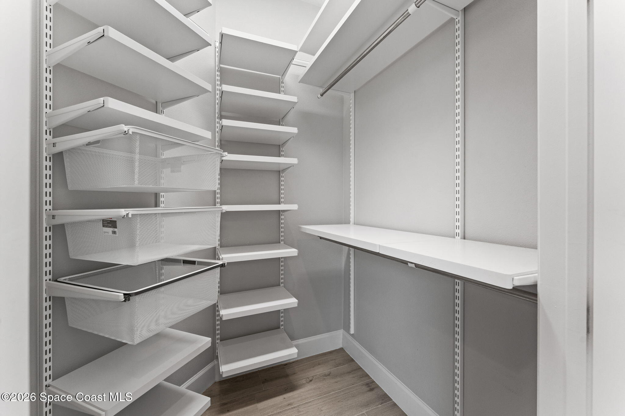 3158 Addison Drive Melbourne, FL 32940 - Photo 25 of 51 a view of walk in closet with empty racks