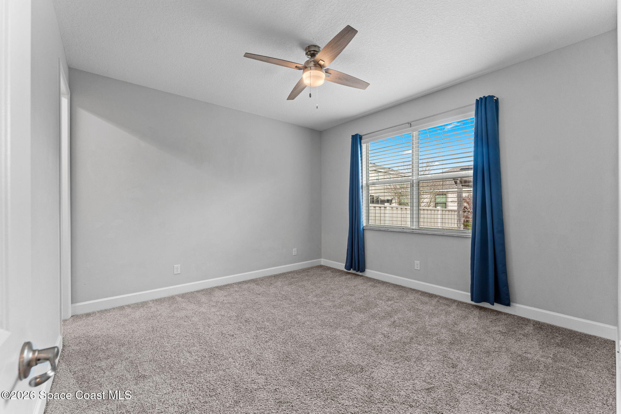 3158 Addison Drive Melbourne, FL 32940 - Photo 29 of 51 a view of an empty room with a window