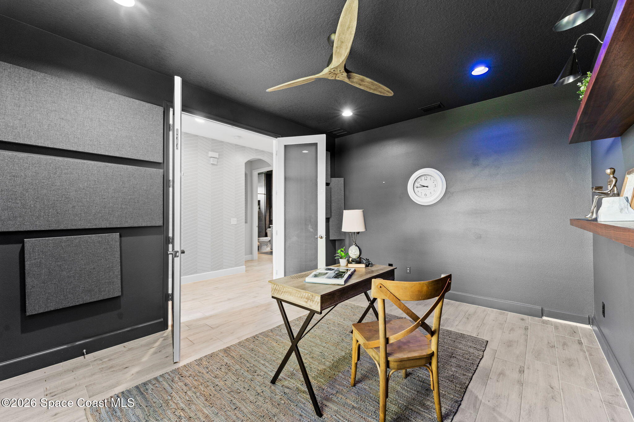 3158 Addison Drive Melbourne, FL 32940 - Photo 34 of 51 a view of a livingroom with furniture and wooden floor