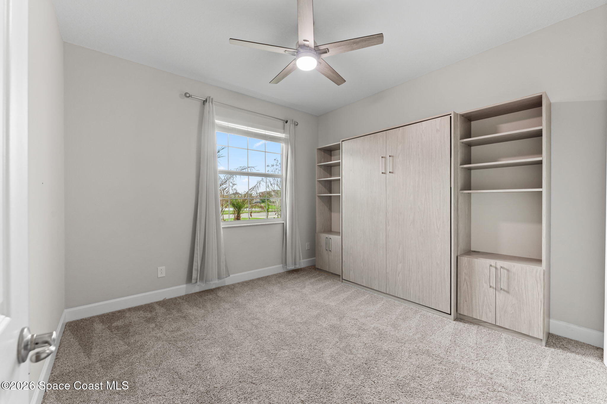 3158 Addison Drive Melbourne, FL 32940 - Photo 35 of 51 a view of an empty room with a window