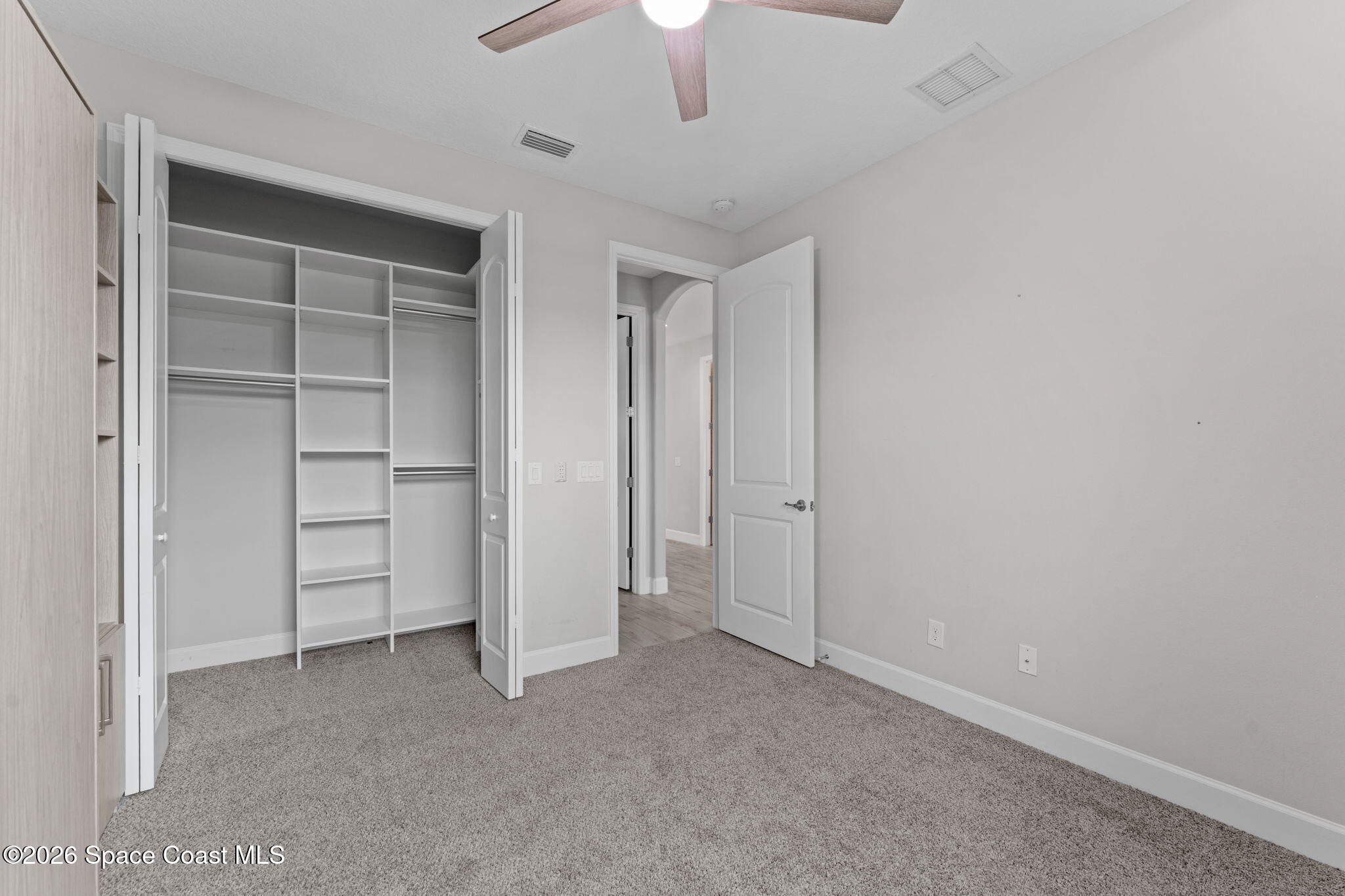 3158 Addison Drive Melbourne, FL 32940 - Photo 36 of 51 a view of an empty room with a closet