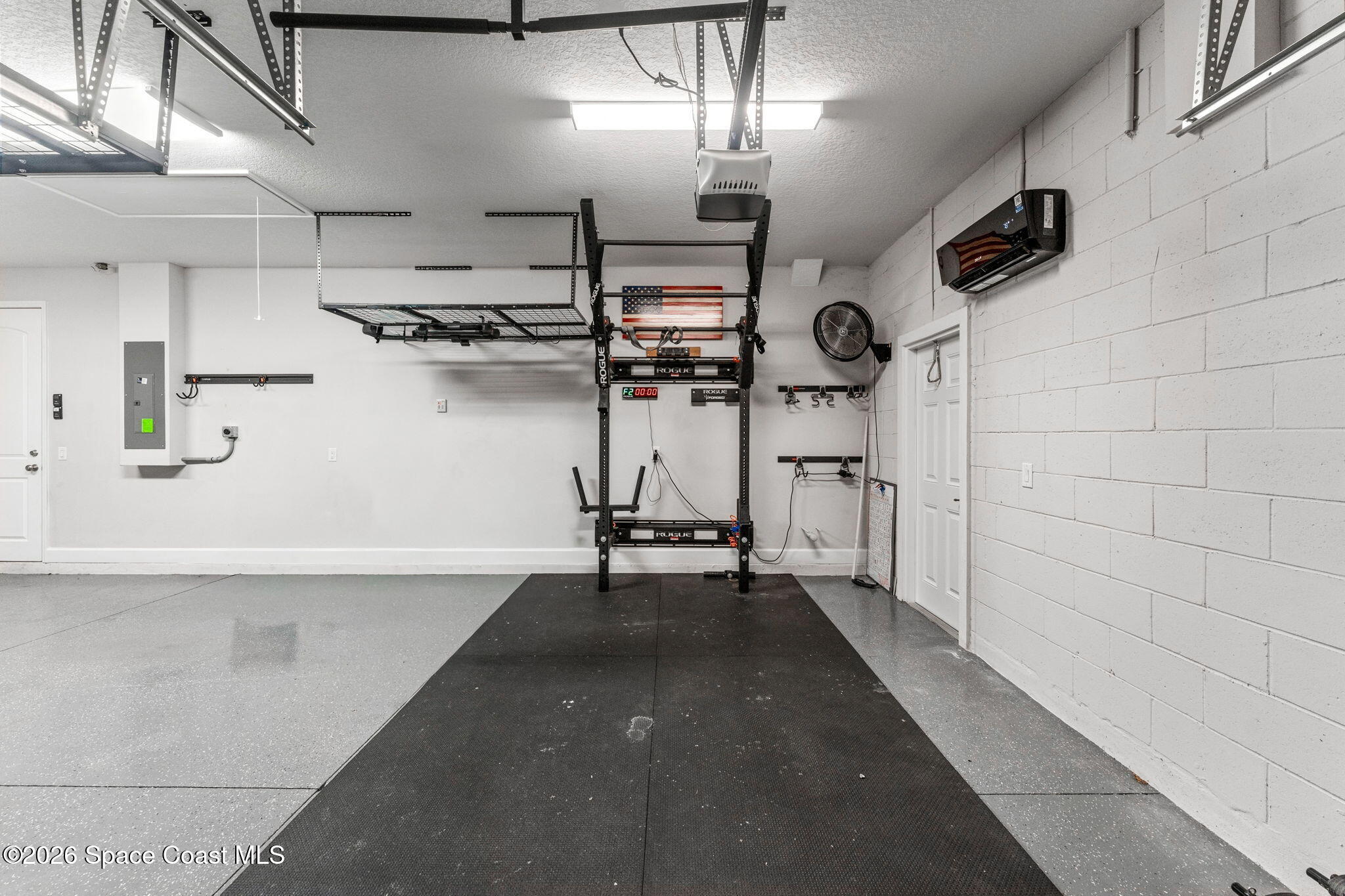 3158 Addison Drive Melbourne, FL 32940 - Photo 40 of 51 a view of a room with gym equipment