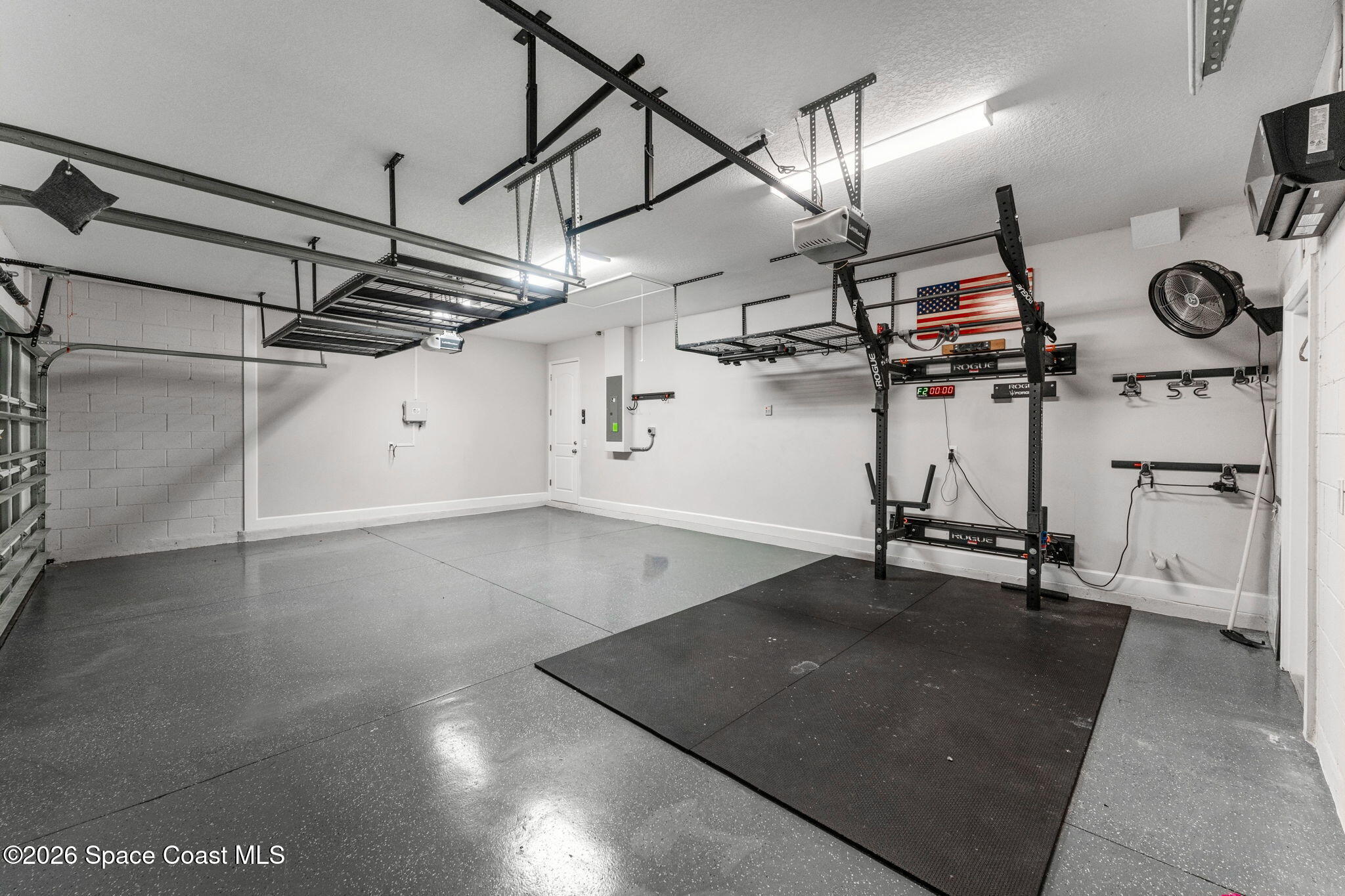 3158 Addison Drive Melbourne, FL 32940 - Photo 41 of 51 a view of a room with gym equipment