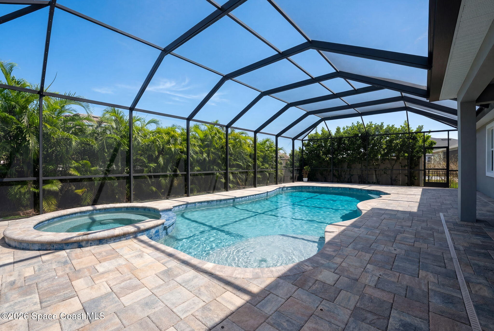 3158 Addison Drive Melbourne, FL 32940 - Photo 44 of 51 a view of a backyard with swimming pool