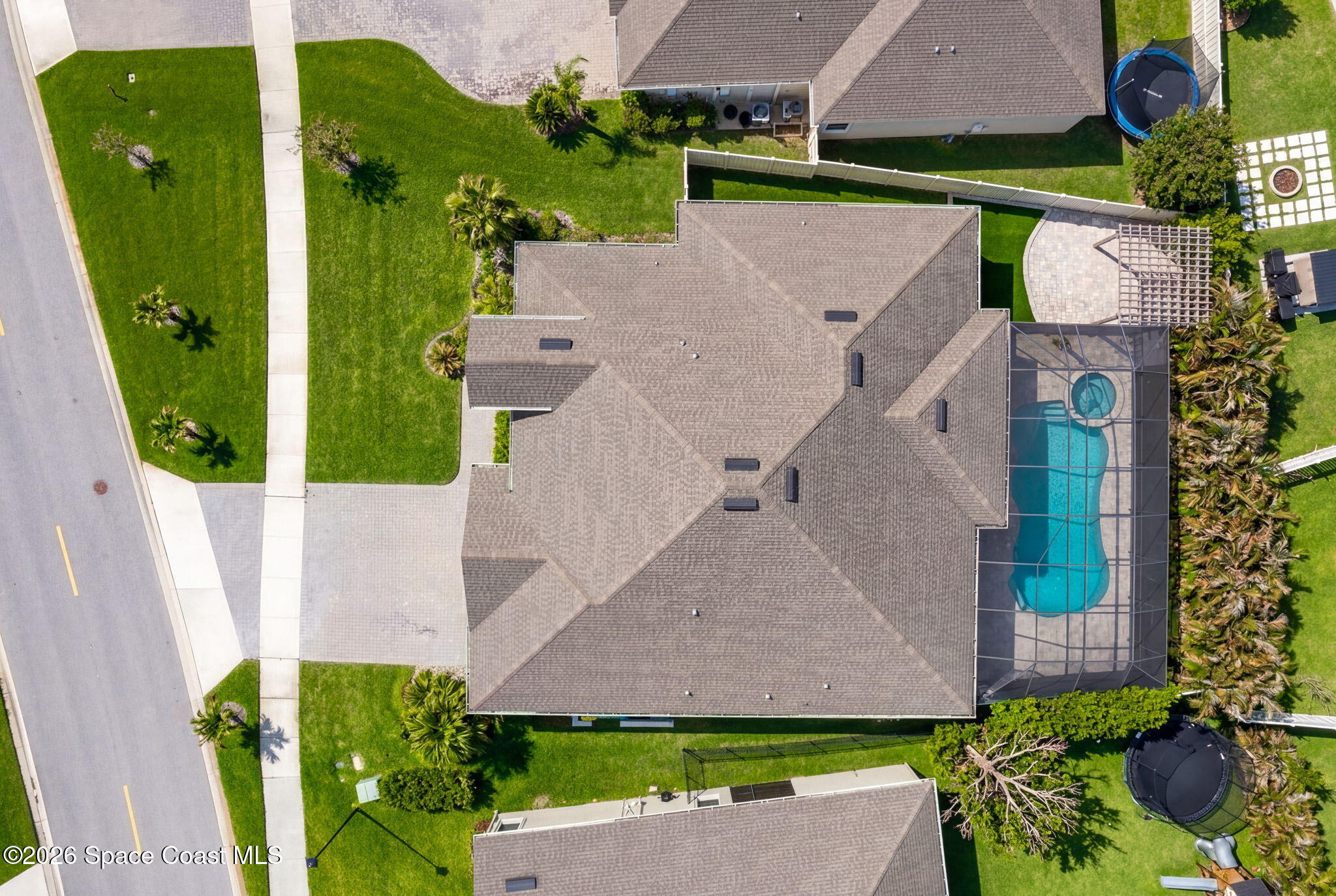 3158 Addison Drive Melbourne, FL 32940 - Photo 49 of 51 an aerial view of a house with a garden and plants