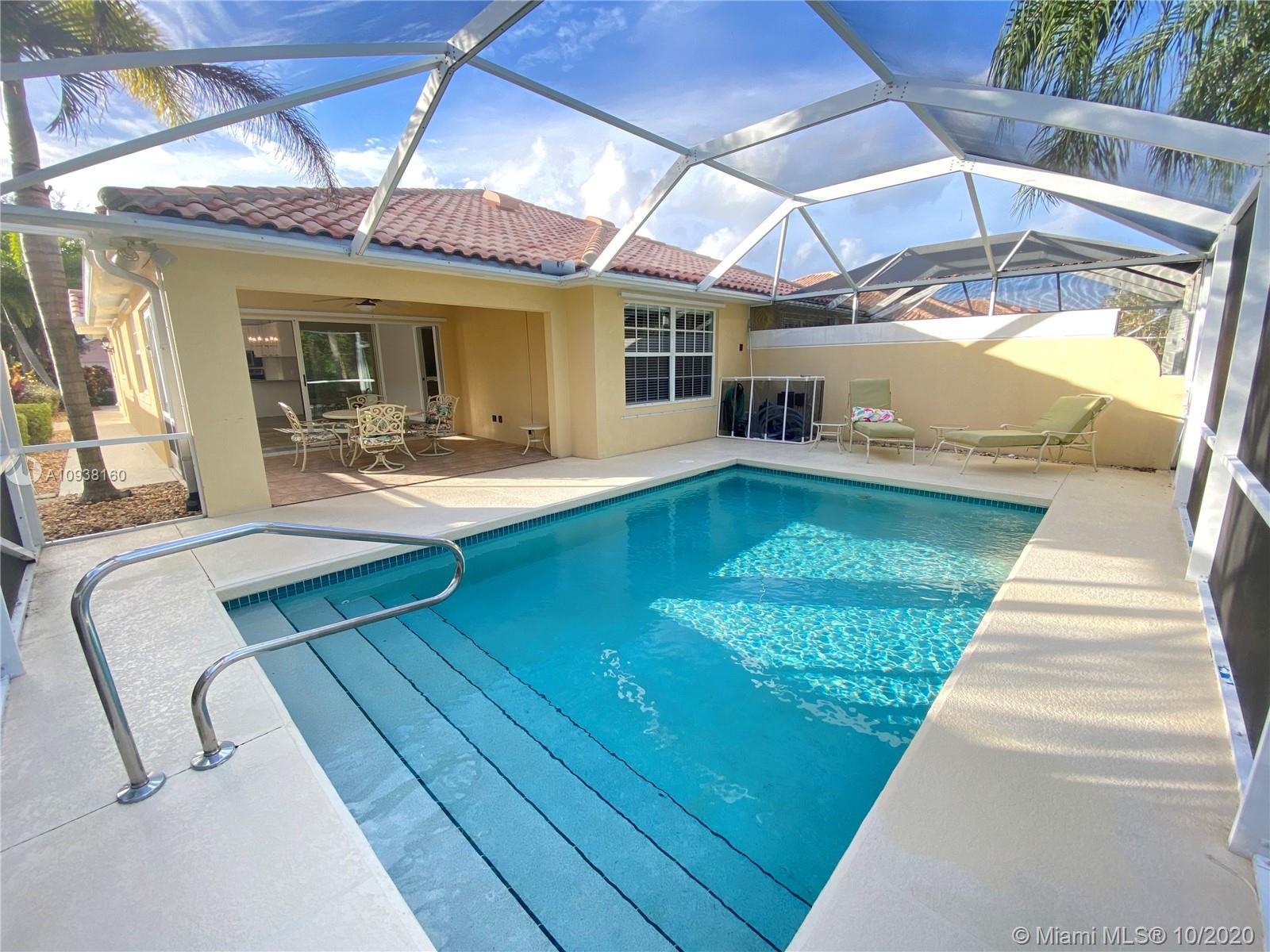 882 Southwest Balmoral Trace Stuart, FL 34997 - Photo 13 of 17 Pool with patio area