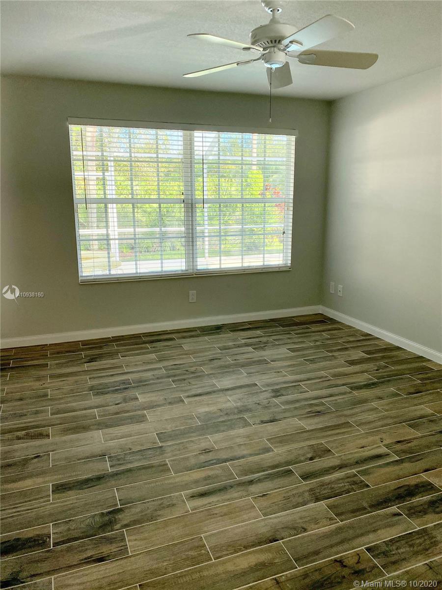 882 Southwest Balmoral Trace Stuart, FL 34997 - Photo 7 of 17 Master bedroom with view to the pool