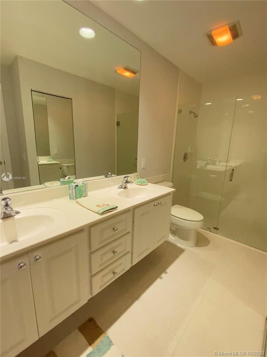 882 Southwest Balmoral Trace Stuart, FL 34997 - Photo 9 of 17 Master bathroom with new frameless shower doors