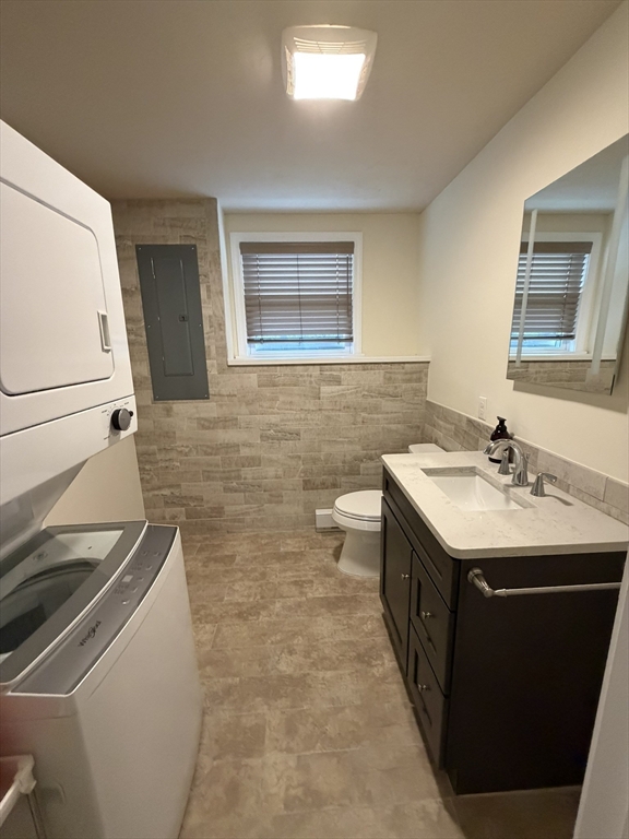 90 High Street, Unit 2 Mansfield, MA 02048 - Photo 12 of 20 a bathroom with a sink and a mirror