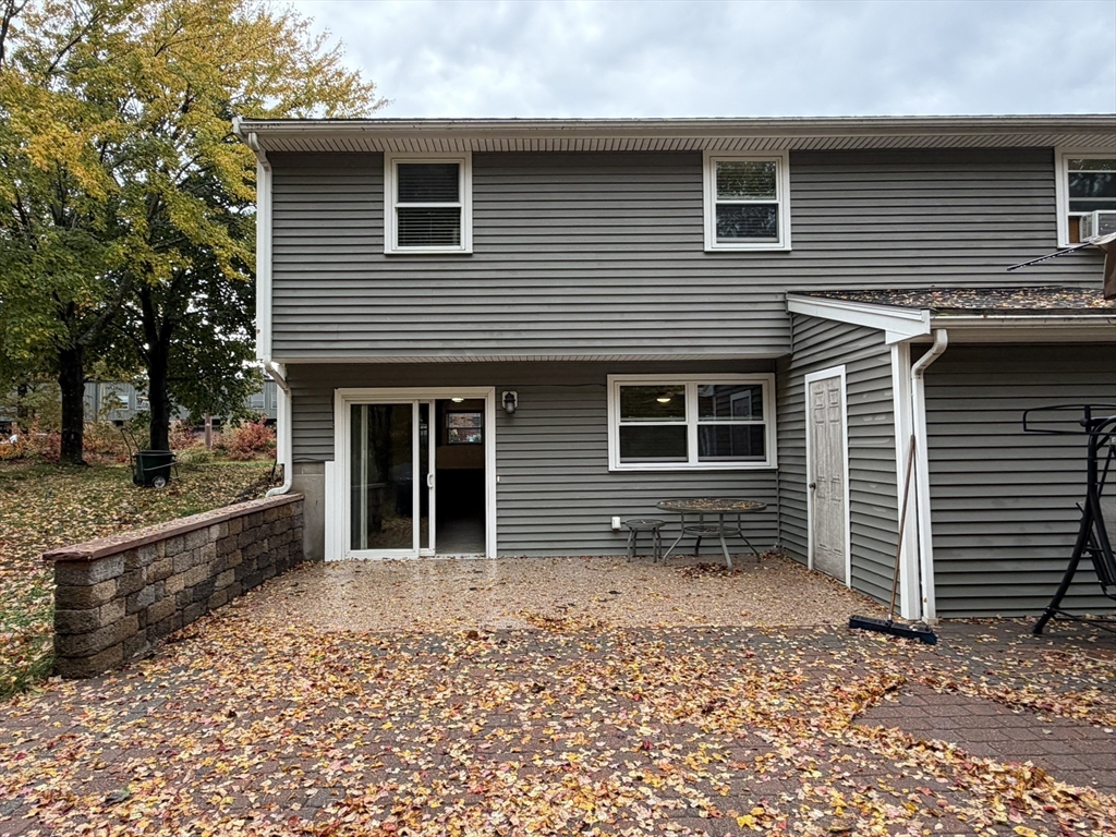 90 High Street, Unit 2 Mansfield, MA 02048 - Photo 17 of 20 a front view of a house with garden