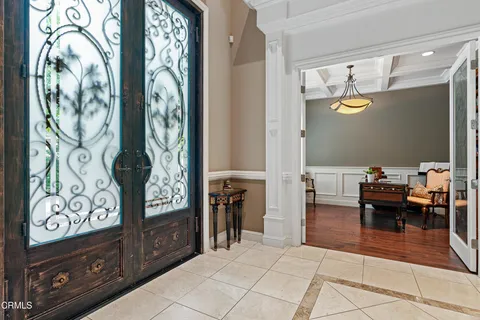 a view of living room filled with furniture and rug