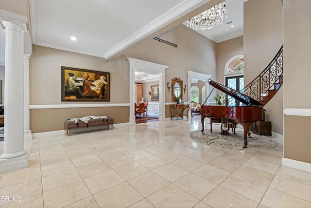 a view of a livingroom with furniture and a flat screen tv