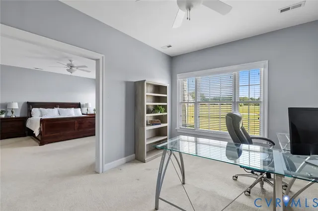 a workspace with furniture cabinet and a window