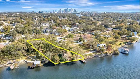 an aerial view of residential building with ocean view