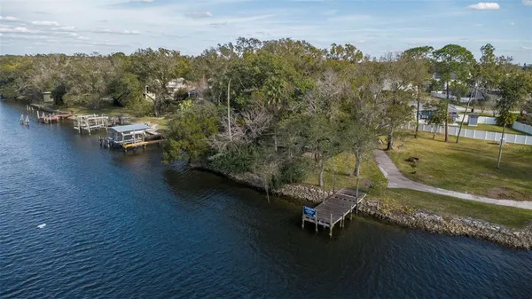 a view of a lake with a deck