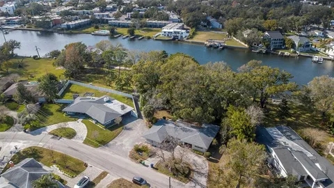 an aerial view of residential house with outdoor space