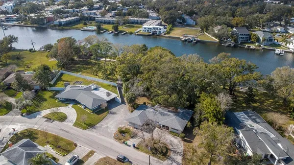 an aerial view of a house with a ocean view