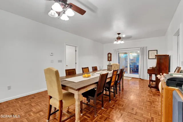 a view of a dining room with furniture