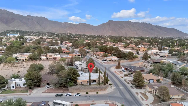 a view of a city with a mountain